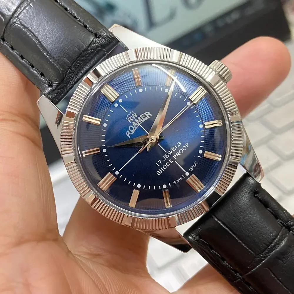 Vintage 1980 Roamer Manual Mens Silver Watch W/Fluted Bezel & Blue accents